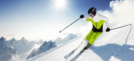 Person skiing on snowy mountain